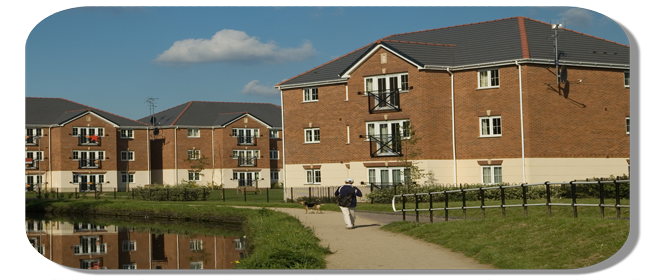 Our Care Homes banner - 2 houses at dusk